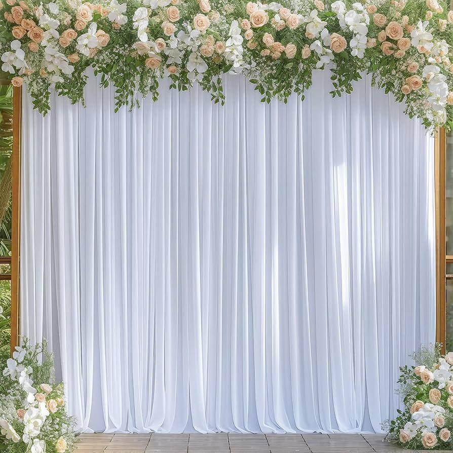 White drapery with florals for photo booth backdrop ideas