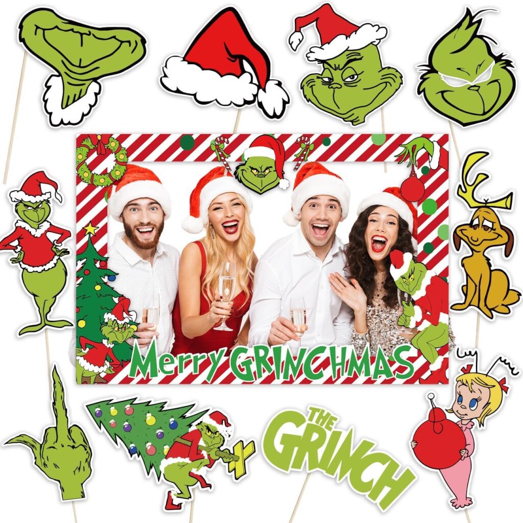 Friends posing with Grinch props

